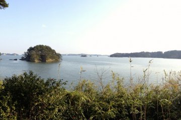 <p>View of islands looking south from one of the many lookouts on Fukuurajima's foot paths.</p>