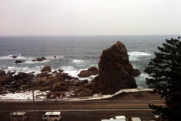 Waves break along the rocky coast.&nbsp;