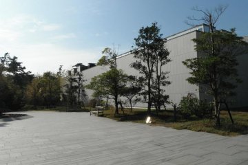 Outside the modern building.