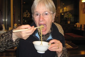 <p>I really don't know how to eat ramen; I ate directly out of the stone bowl. Looks like my mother has the hang of it</p>