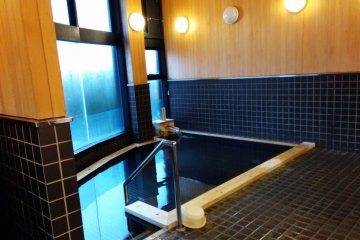 <p>The onsen doesn't offer much of a view, but it seems new and is clean. The wood gives off a wonderful aroma when it meets the hot steam.</p>