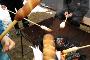 <p>When the bread turns a golden brown, or is burnt black beyond recognition, it is time to eat!</p>