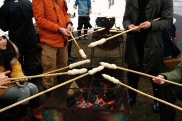 <p>After the igloo making experience, you can warm up by making your own bread on a stick.</p>