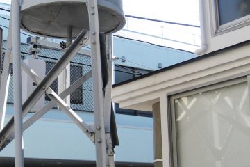 Original water tank at the front of the gallery