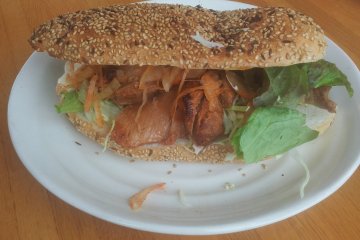 <p>One of the restaurants in the base building had an interesting menu. The Mega Chicken Sandwich - home-made bread and chicken from the rotisserie.</p>