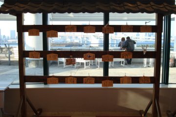 Ema boards hanging in the Aqua City Odaiba Shrine