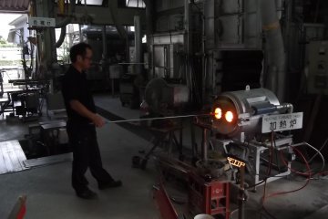 <p>In the glassware factory</p>